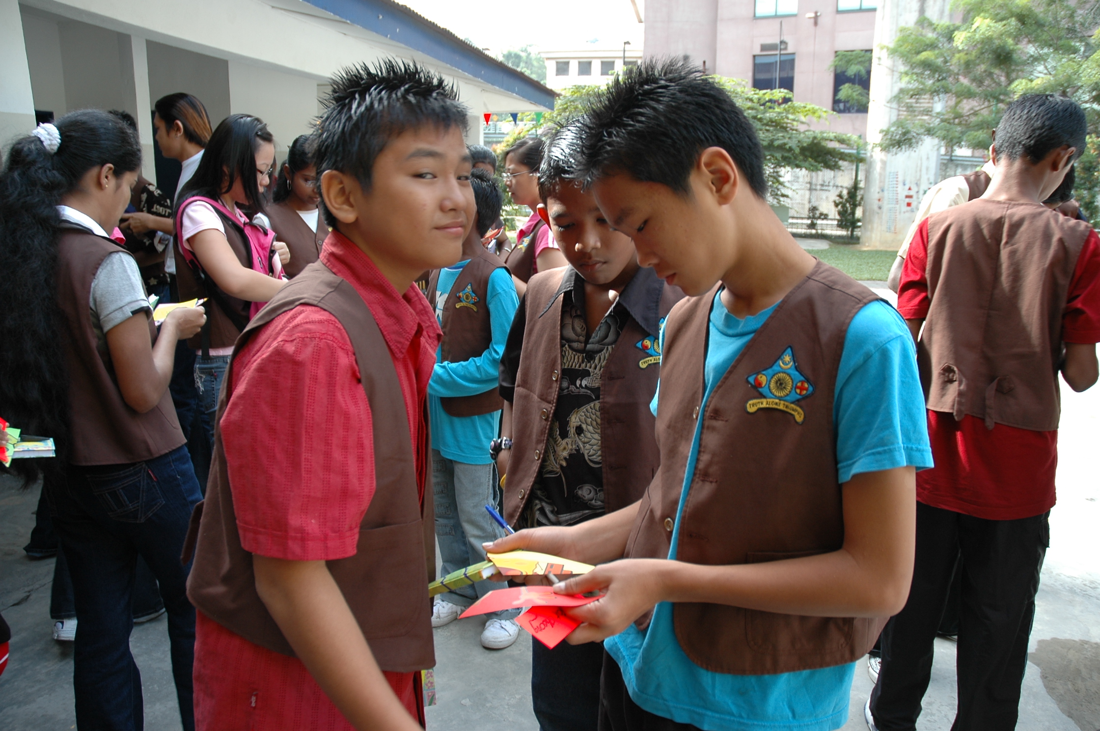 ‘This is easy!... Kok Seng & Kok Cheong from  the Pure Life Society figuring out their first task